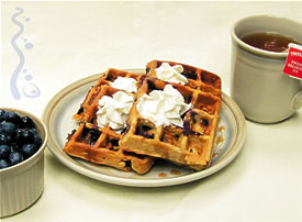 Blueberry Waffles Topped with Whipped Cream